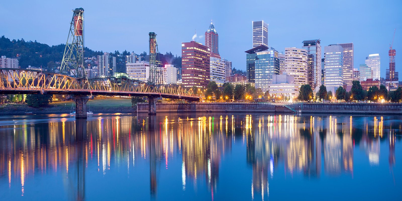 Portland skyline with bridges over Willamette River and Mt. Hood in distance